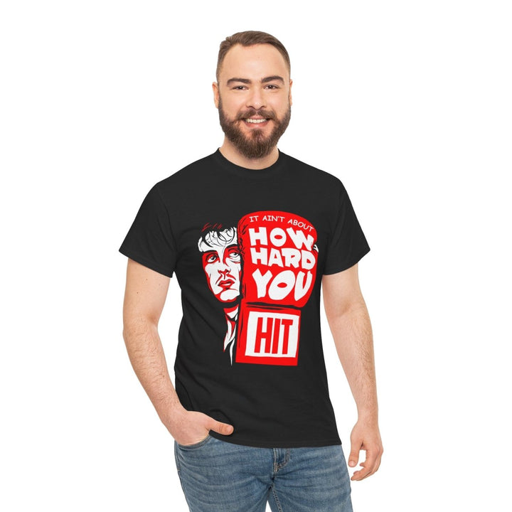 Inspirational Unisex Heavy Cotton Tee - "It Ain't About How Hard You Hit" - Black - S - Inspirational Unisex Heavy Cotton Tee - "It Ain't About How Hard You Hit" - Tatoo Tee